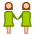 Deux femmes se tenant la main