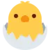 Pulcino che esce dall'uovo