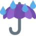 빗방울을 맞고 있는 우산