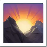Nascer do sol sobre montanhas nos iOS iPhones e macOS da Apple
