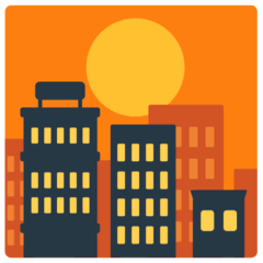 Puesta de sol sobre edificios on Mozilla