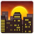 Pôr do sol sobre edifícios Emoji Samsung