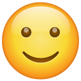 Слегка улыбающееся лицо Эмодзи в WhatsApp